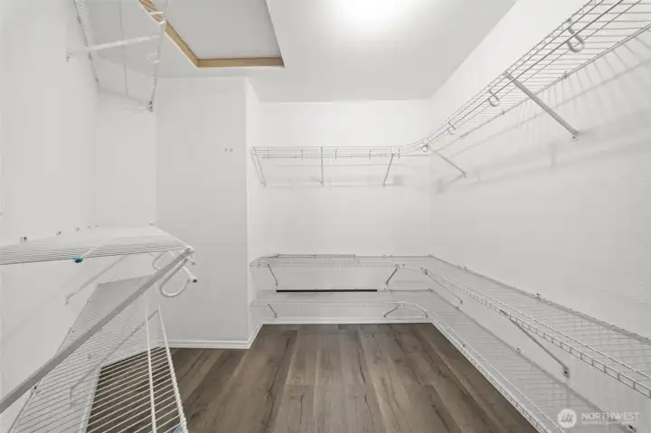 Primary walk-in closet Primary walk-in closet