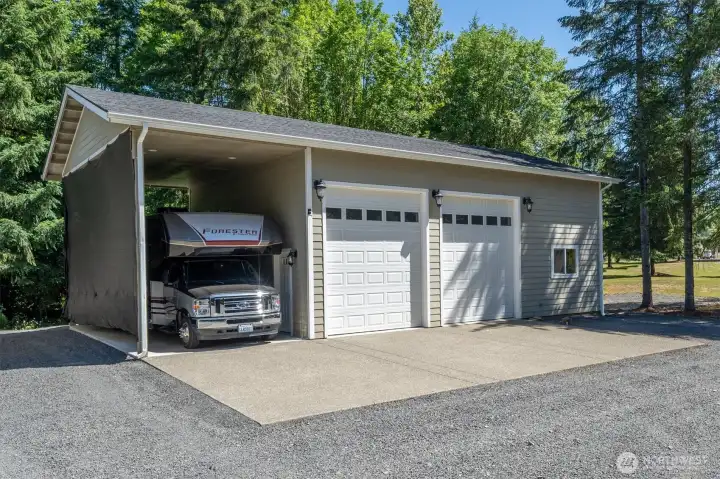 Shop has new doors and a 300+ sq ft carport.