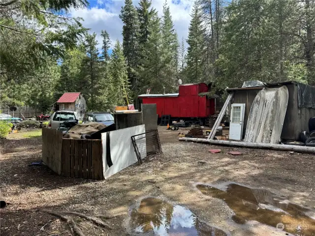 Caboose and all outbuildings included in sale