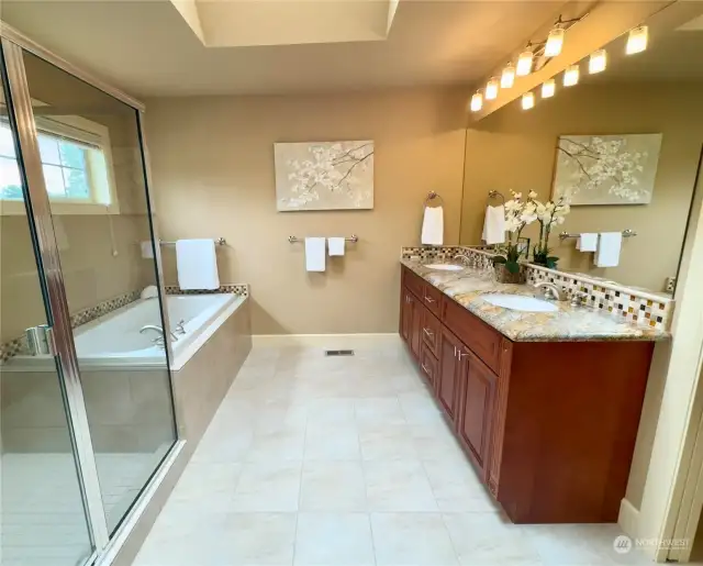 5 piece ensuite bath has a soaking tub, shower, granite counters and plenty of storage space.