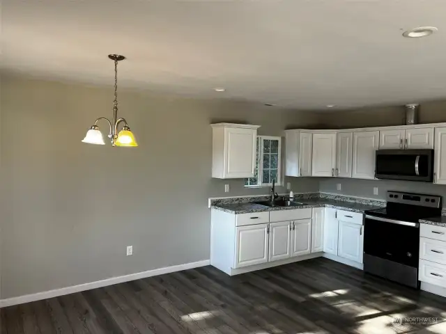 Kitchen showing dining area