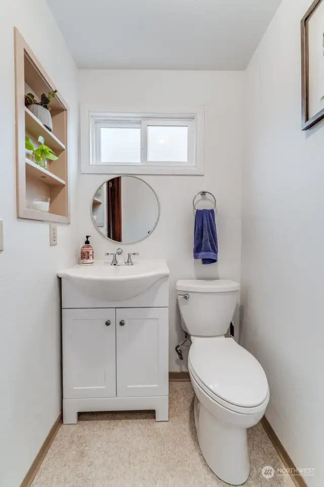 Powder room off entryway