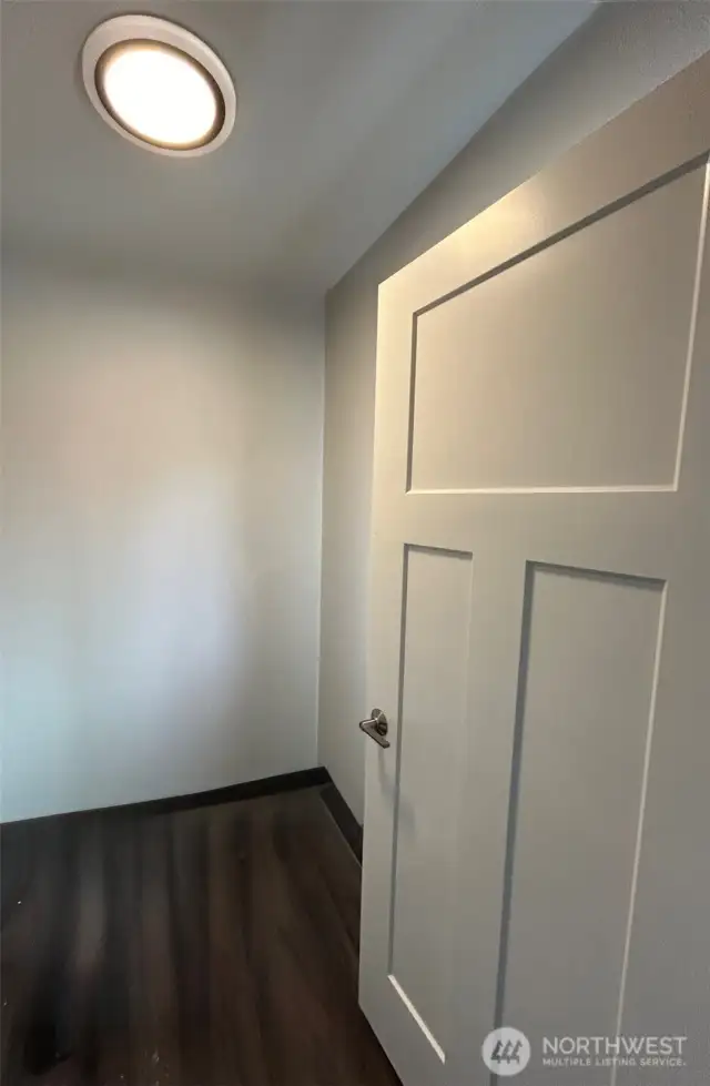 Master Bedroom has large walk-in closet with window behind door.