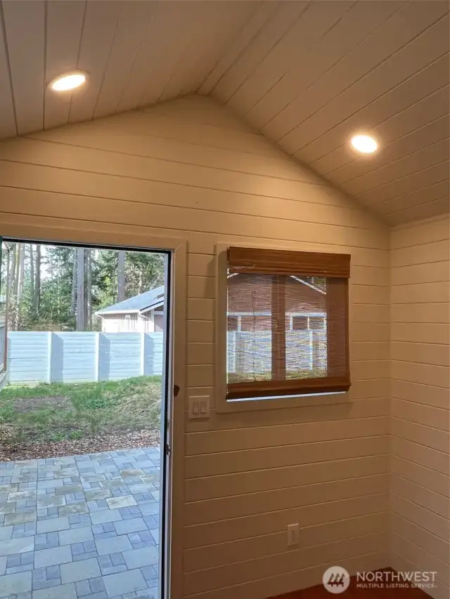 Recessed lighting, Tongue and groove flooring and custom shiplap walls.
