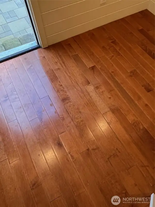 Tongue and groove Flooring and custom shiplap walls.