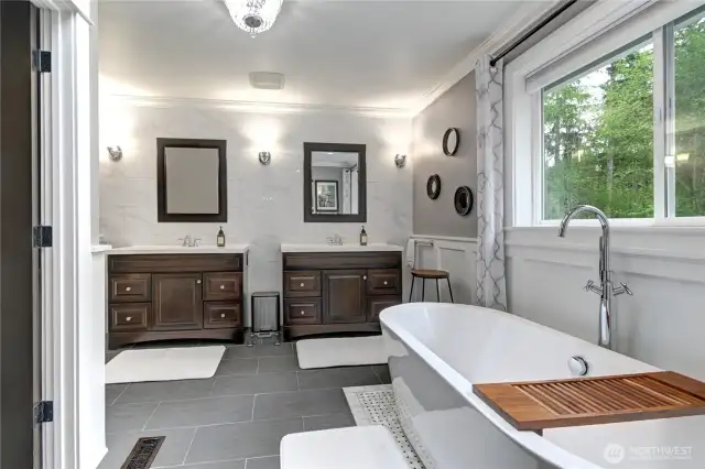 Primary bathroom with individual sinks.