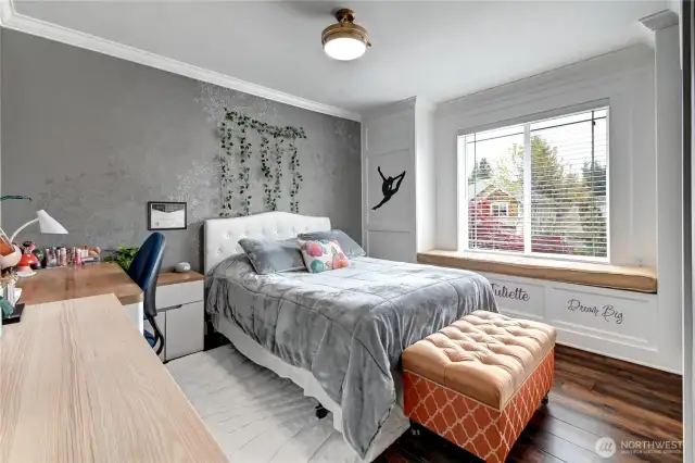 4th bedroom with bay window and seat.