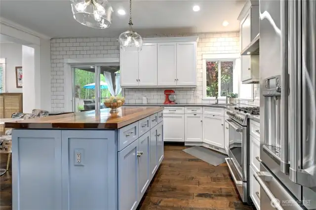 Large functional Island in kitchen with storage.