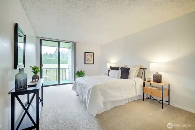 Primary Suite with west-facing deck and not a neighbor in sight.