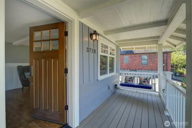 Craftsman front porch complete with porch swing.