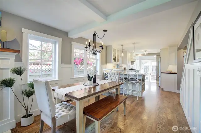 Open floor dining area, leads to kitchen.