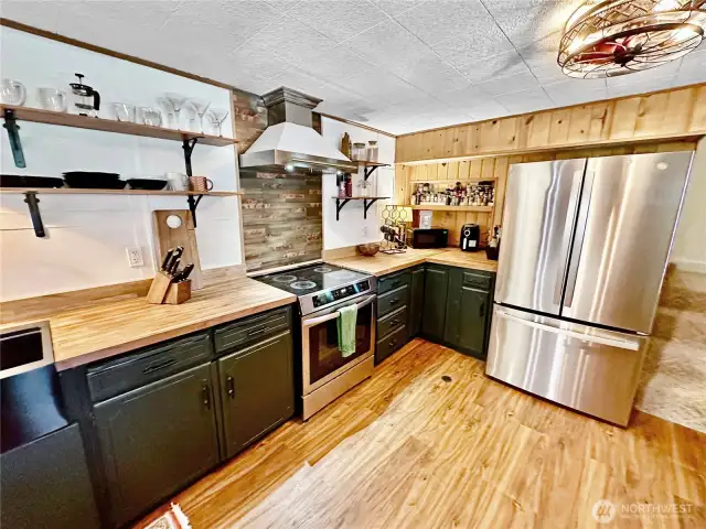 Another kitchen view...all appliances stay  and new luxury vinyl plank flooring too!