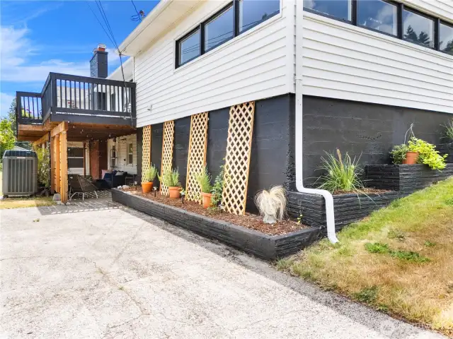 This show the rear of the house with the approach to the lower level.
