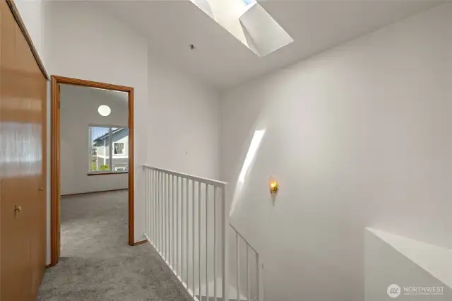 Upstairs hallway, looking west. Laundry closet is to the left.