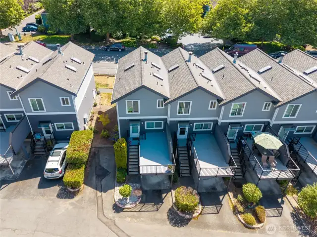 Well maintained complex with decks and carports.