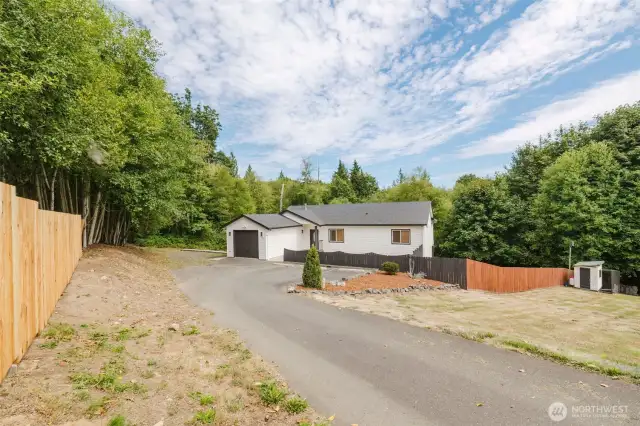 Long private drive offers added seclusion and privacy