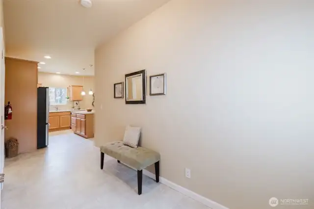 Bright entry with natural light and neutral finishes