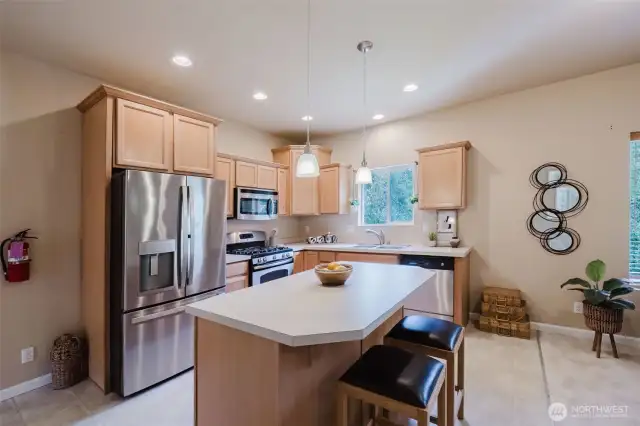 Large kitchen island with bar seating and great prep space