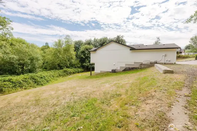 Level lot with plenty of outdoor space for entertaining or play