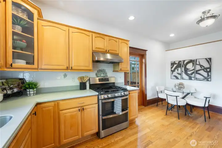 eat-in kitchen overlooks back yard and has side door access