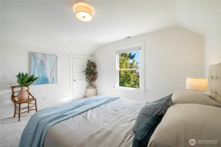one of three upstairs bedrooms - this one with a peek-a-boo view of Mt. Rainier