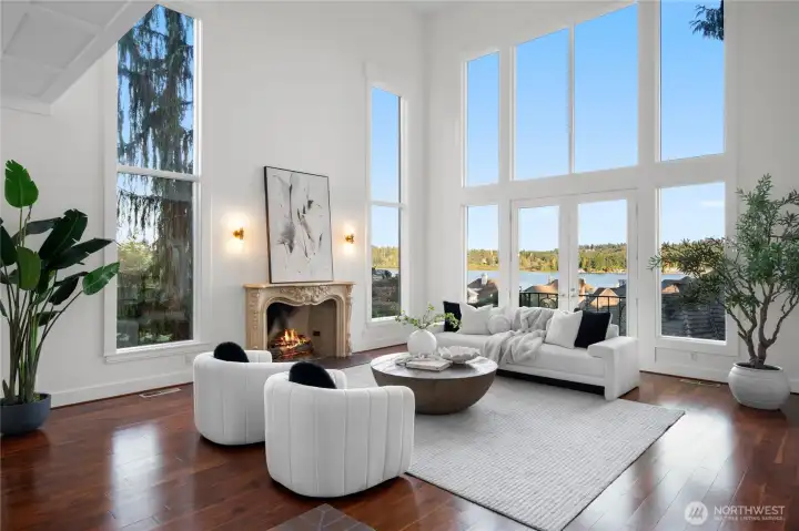 Nearly 20' ceilings and lake views welcome you from the great room