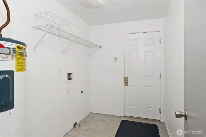 Main floor laundry, mud room, garage entrance