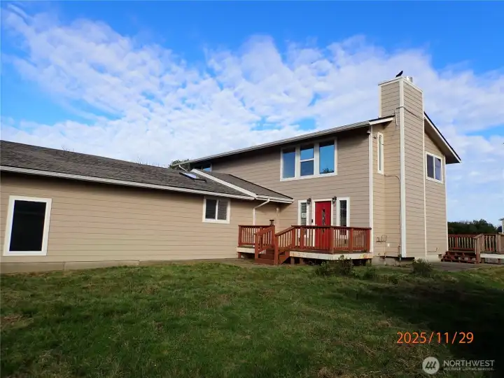 Front of home with Fully Fenced yard