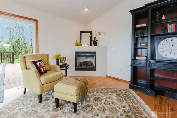 Family room off of Kitchen has slider to deck