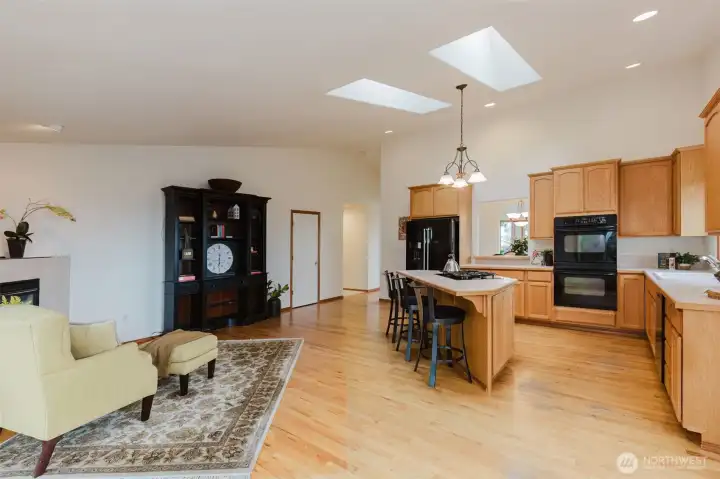 Kitchen flows to Family Room