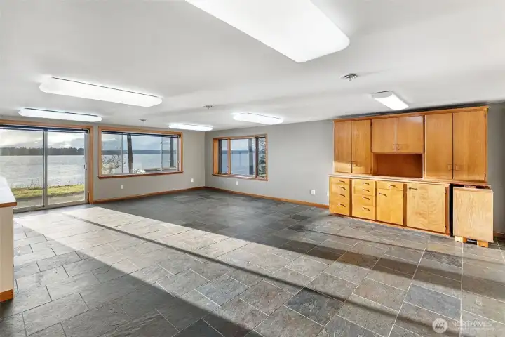 Large multi-purpose room with storage, ideal for crafts, hobbies, or flexible use.