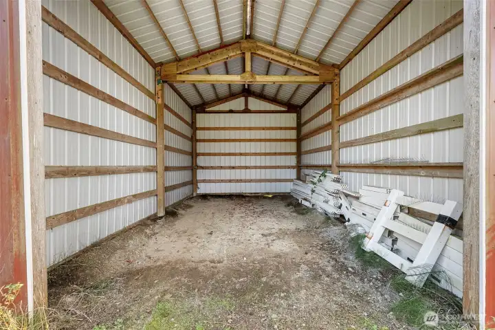 Covered parking area suitable for RVs or boats.