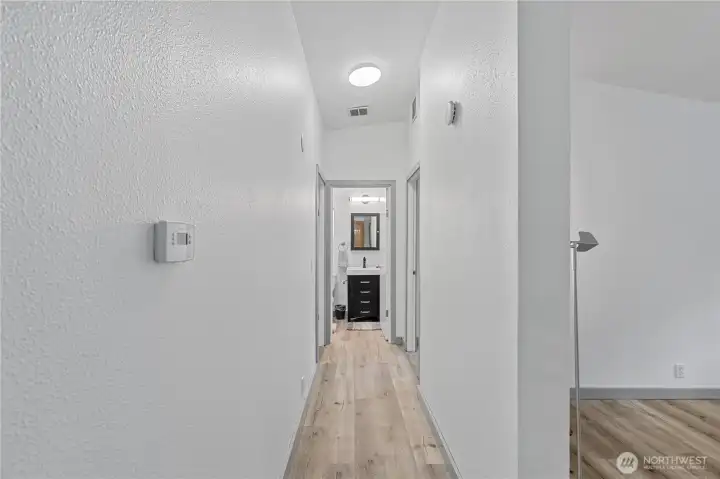 Hallway to bedrooms and bathroom
