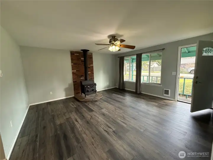 Livingroom with great lighting and wood stove