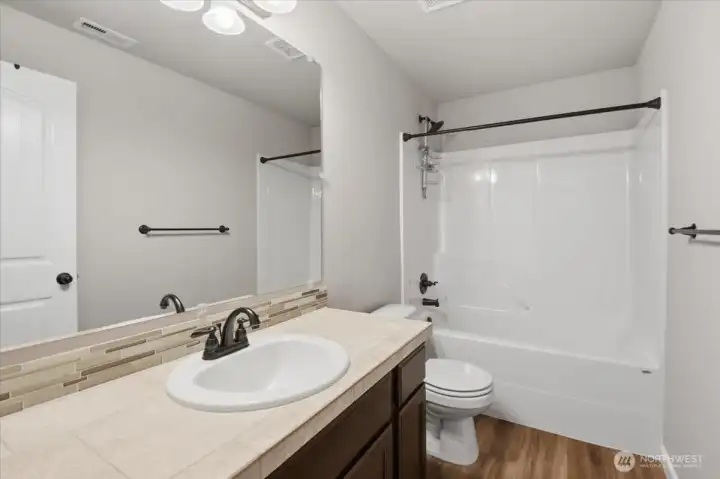 Second full bathroom on the upper level.
