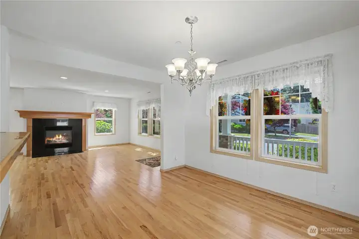 The living room and Formal Dining room faces the front. Oakwood floors throughout the main floor. A Cozy gas fireplace for the Holidays. Abundant natural light.