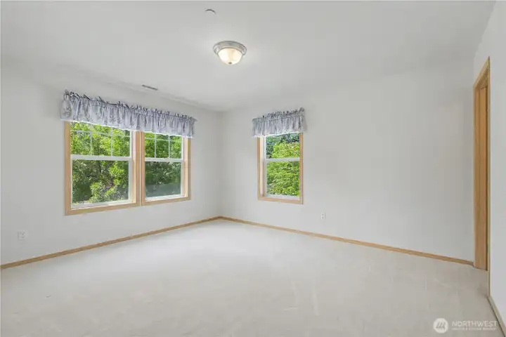 Third bedroom also facing the front with walk-in closet.