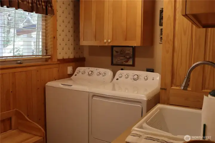 Laundry sink and washer dryer