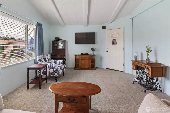 Large family room, vaulted ceilings.