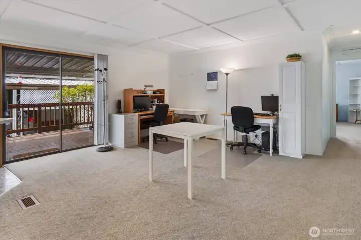 More large living spaces, living room with slider to the lovely deck.