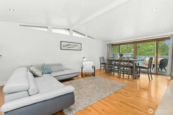 vaulted ceilings over the great room with cozy fireplace
