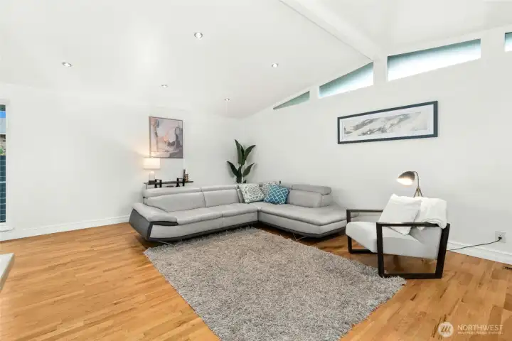 Shining real hardwood floors grace the main floor