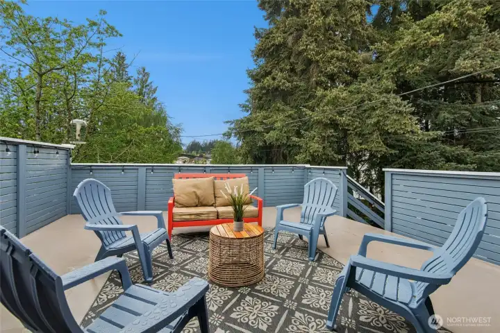 large deck overlooking the backyard