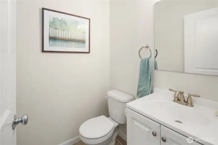 powder bath with a new vanity and toilet