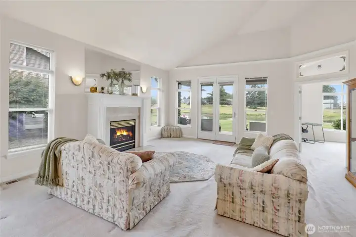 Expansive windows frame tranquil pond views and fill the home with natural light. Expansive windows frame tranquil pond views and fill the home with natural light.