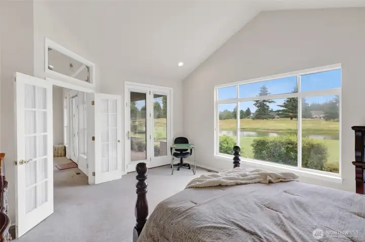 A spacious retreat with direct access to the covered porch and pond views. A spacious retreat with direct access to the covered porch and pond views.