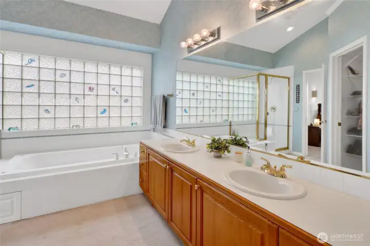 Double sinks & large vanity, water closet. Double sinks & large vanity, water closet.