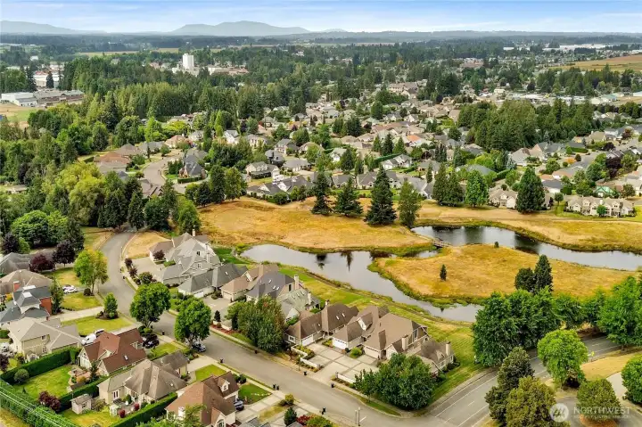 Surrounding the community pond are just eleven homes, thoughtfully arranged in intimate clusters that share private driveways and additional parking areas. This unique design creates a charming neighborhood atmosphere while preserving the peaceful character of the pond setting and encouraging a close-knit sense of place. Surrounding the community pond are just eleven homes, thoughtfully arranged in intimate clusters that share private driveways and additional parking areas. This unique design creates a charming neighborhood atmosphere while preserving the peaceful character of the pond setting and encouraging a close-knit sense of place.