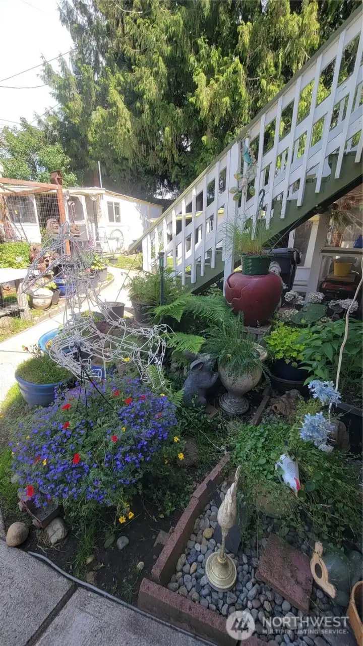 garden stairs up to back bedroom and shop area in the distance. garden stairs up to back bedroom and shop area in the distance.