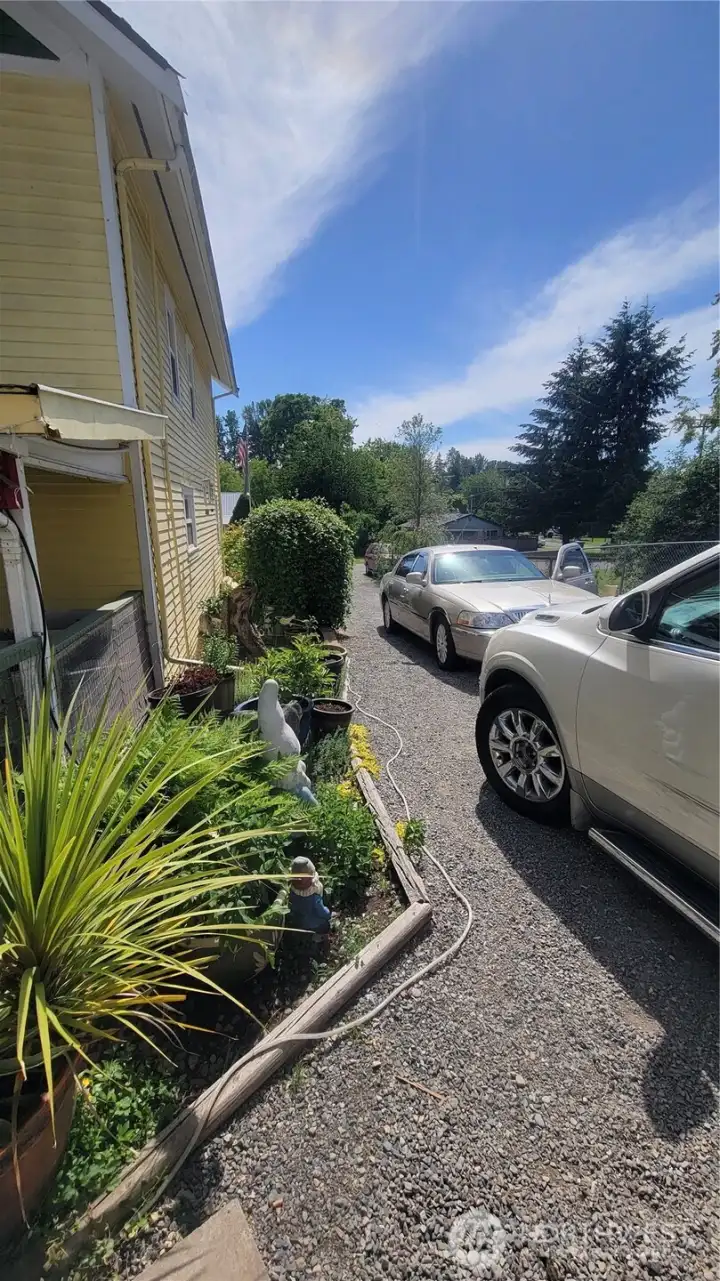 left side doublewide gravel driveway. left side doublewide gravel driveway.